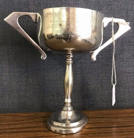 Silver cup with heavy handles