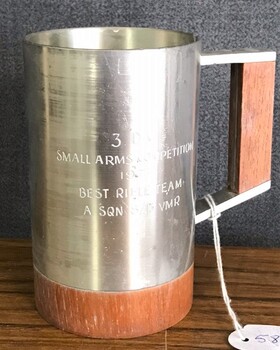 Pewter drinking cup with engraving on side