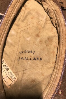 Underside of beret with name and number