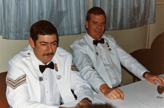 Two soldiers in formal uniform