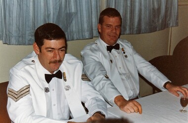 Two soldiers in formal uniform