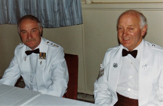 Two soldiers in formal uniform