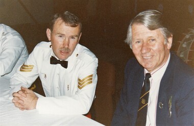 Soldier informal dress and civilian at formal occasion.