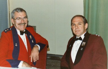 Two officers at a formal dinner