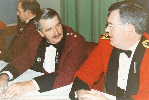 Two officers at a formal dinner
