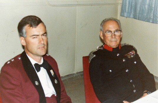 Two officers in formal uniform