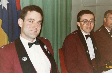 Two officers in formal uniform