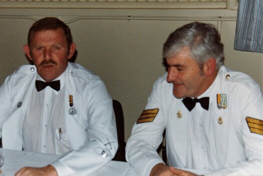 Two soldiers in formal uniform