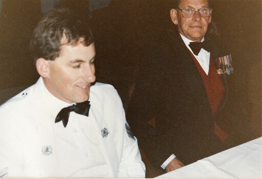 Soldier and former soldier in formal dress.