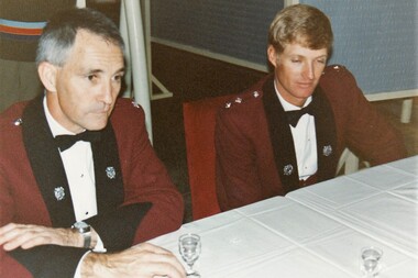 Two officers in formal uniform