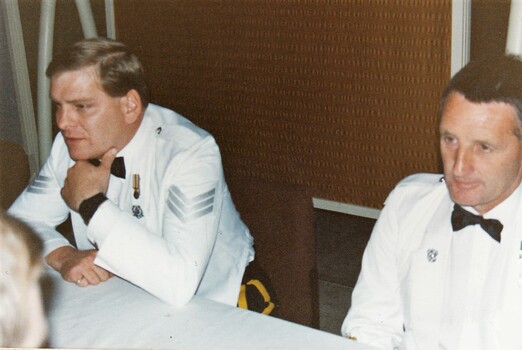 Two soldiers in formal uniform