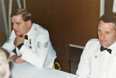 Two soldiers in formal uniform
