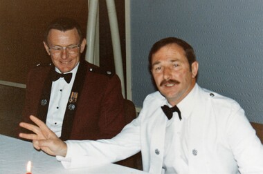 Two soldiers in formal uniform