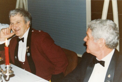 Soldier and civilian in  formal dress