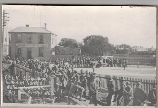 Large group of soldiers at railway station.