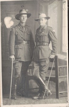 Two army officers with walking canes