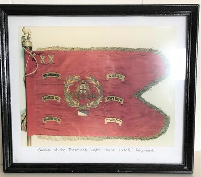 Framed photograph of coloured flag