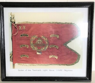 Framed photograph of coloured flag