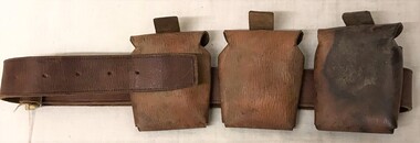 Leather belt with small pouches attached.