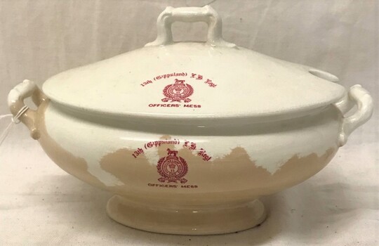 China bowl with lid, monogram on side.