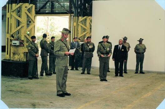 One soldier addressing group of soldiers