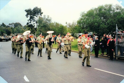 Military band marching on roadway