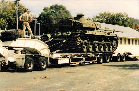 Tank on a low-loader trailer