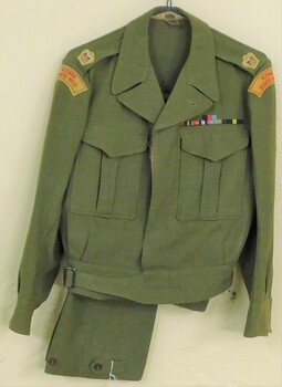 Khaki army uniform with coloured badges