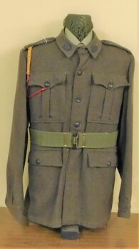 Khaki army uniform with webbing belt