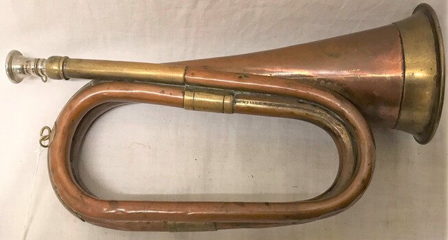 Brass musical instrument with three loops