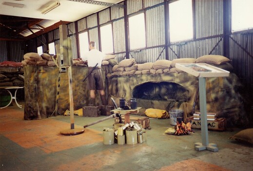 Museum display of trench and mannequin