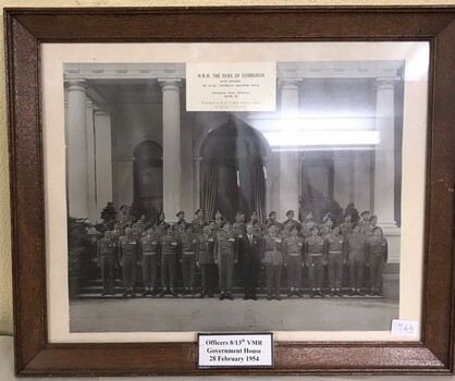 Group of soldiers on steps of building