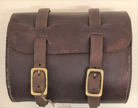 Leather case with straps and buckles