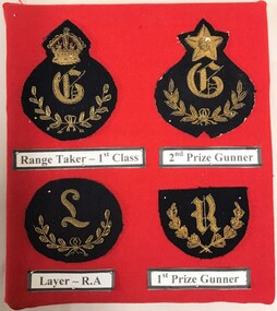 Four embroided badges with labels