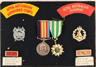 Board with badges and medals