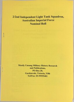 Soft cover booklet with writing on cover.
