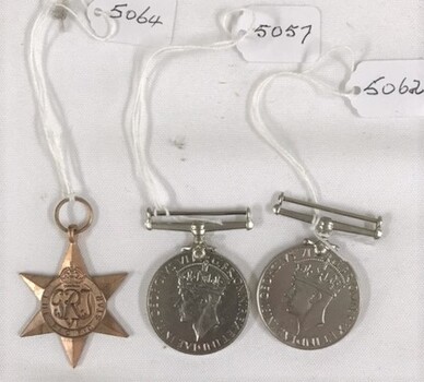 Three medals without any ribbons