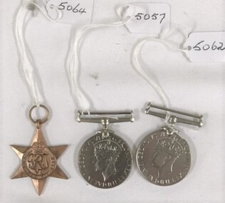 Three medals without any ribbons