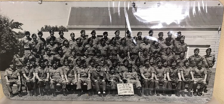 Large group of soldiers in rows.