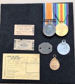 Display board with medals and tickets