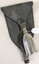 Metal funnel with bag attached to it.