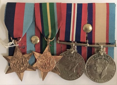 Four medals with hanging ribbons