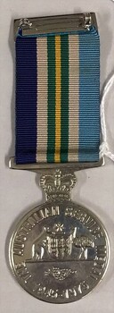 Round medal suspended on ribbon