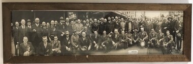 Large group of men in civilian dress 