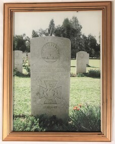 Framed photograph of head stone