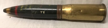Large shell with brass base and pointed nose