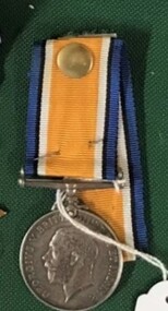 Medal with a coloured ribbon and a tag on string