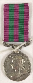 Medal with coloured ribbon attached.