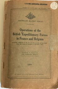 Bulging soft covered book with staples along edge