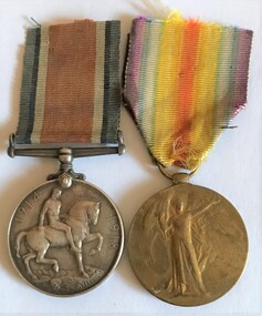 Two medals on ragged ribbons